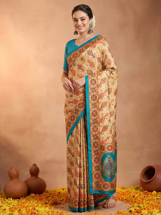 Woman wearing light blue silk blend saree with metallic foil print work and light blue blouse