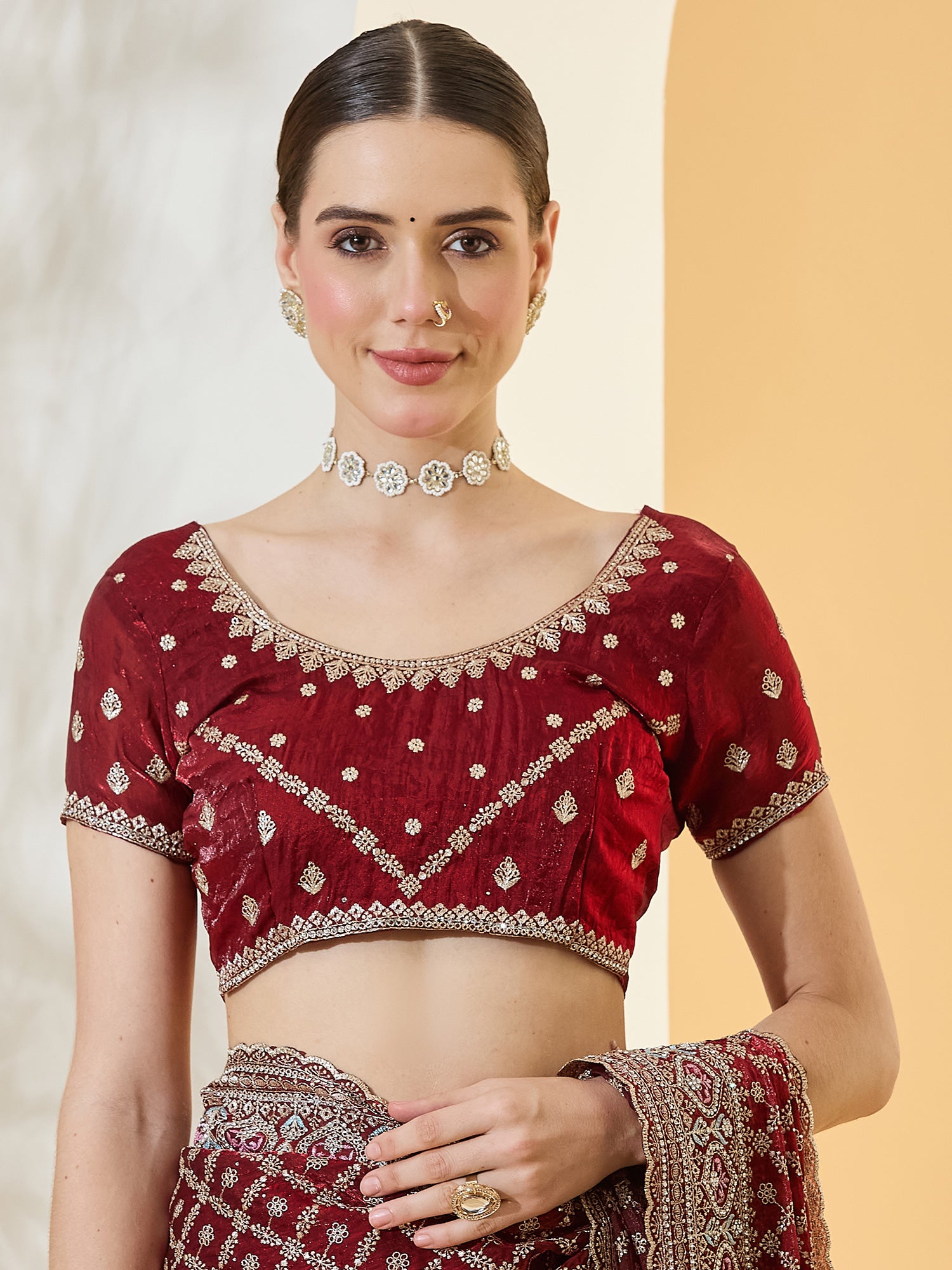 Unstitched maroon satin blouse piece with embroidered design