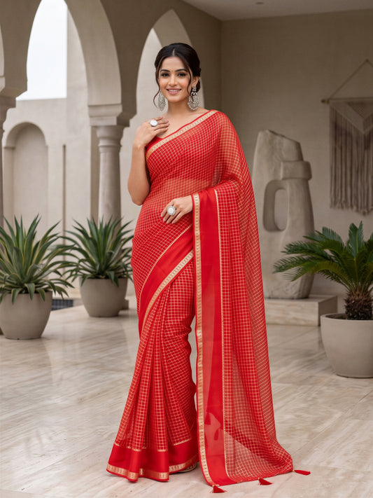 Woman wearing coral viscose saree with checked pattern design and coral blouse