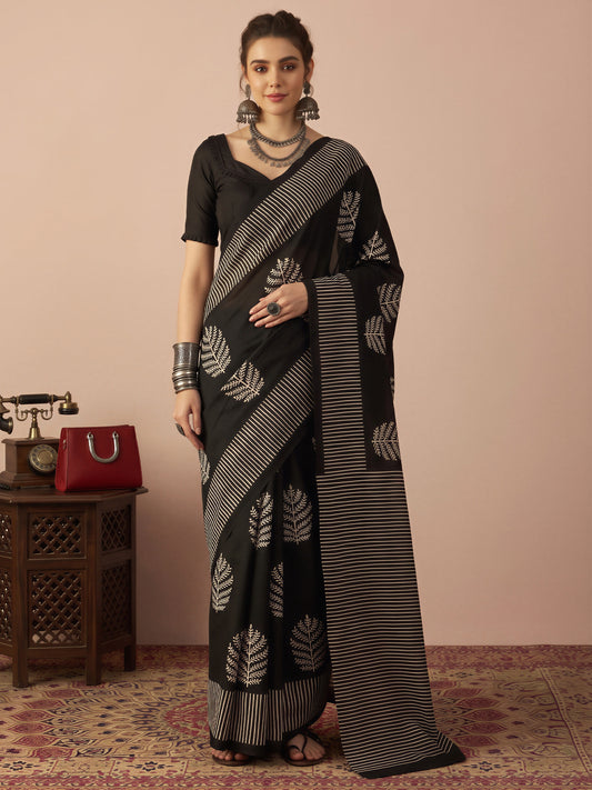 Woman wearing black bhagalpuri silk saree with hand block-printed motifs and black blouse