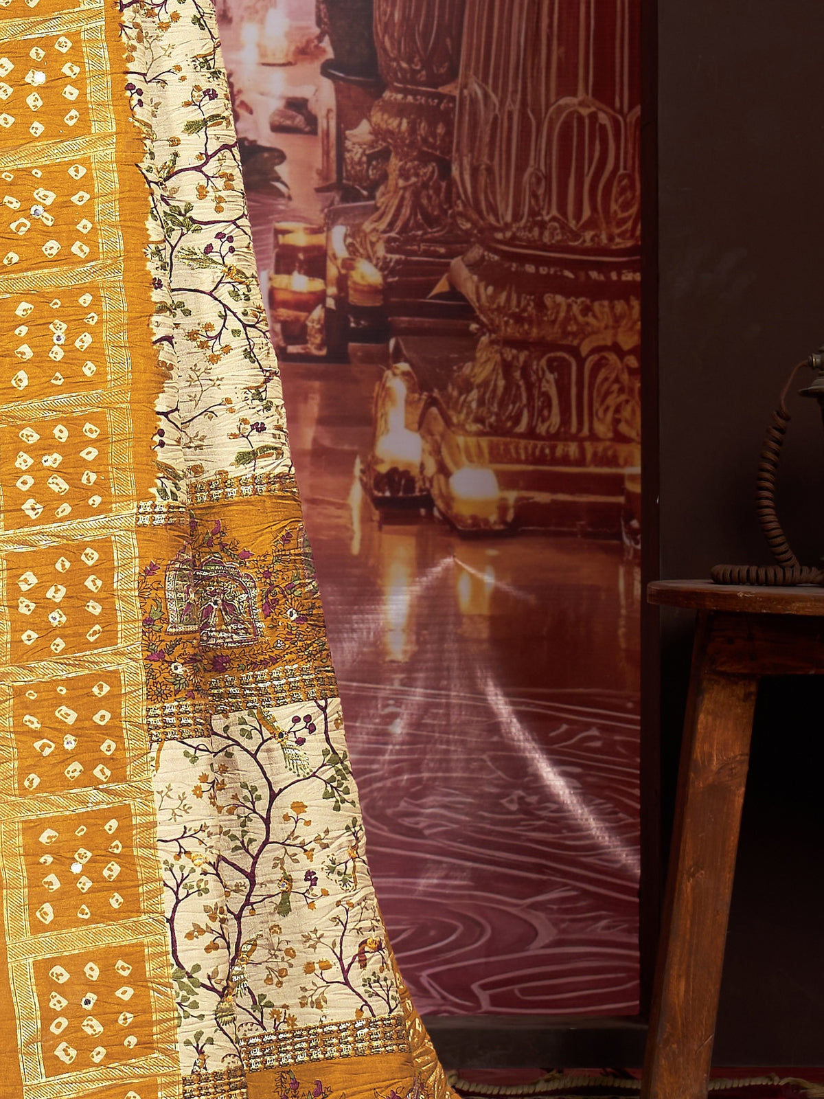 Pallu detail of cream tussar silk saree showing traditional indian motif work and printed border