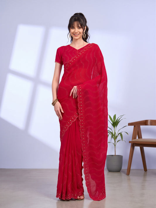Woman wearing red tissue saree with geometric pattern design and red blouse