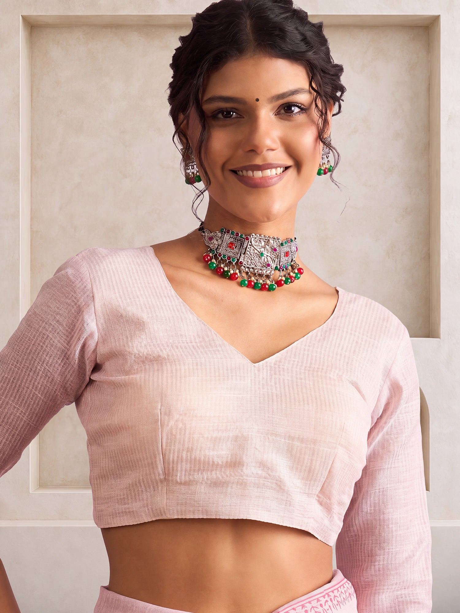 Unstitched pink linen blouse piece with ethnic motif design