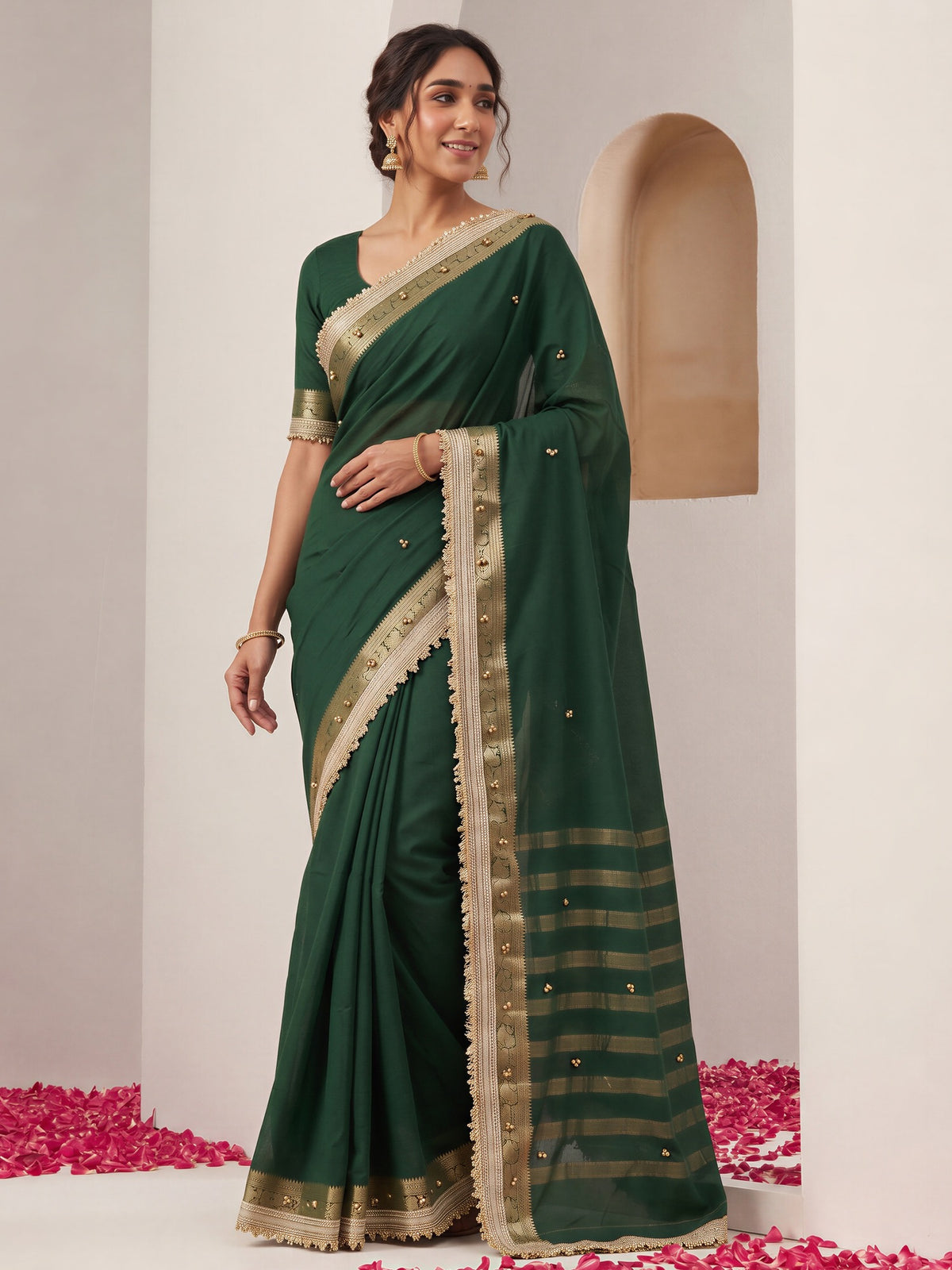 Green woven design soft silk saree with green blouse piece