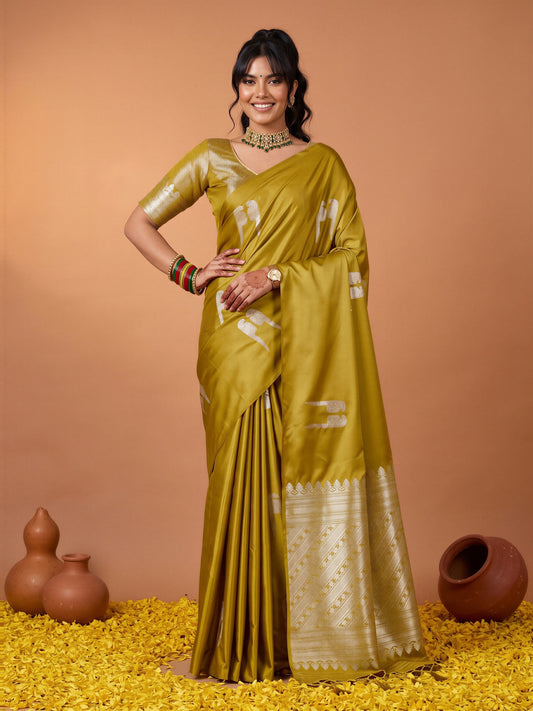 Woman wearing olive satin saree with botanical floral and leaf design and olive blouse