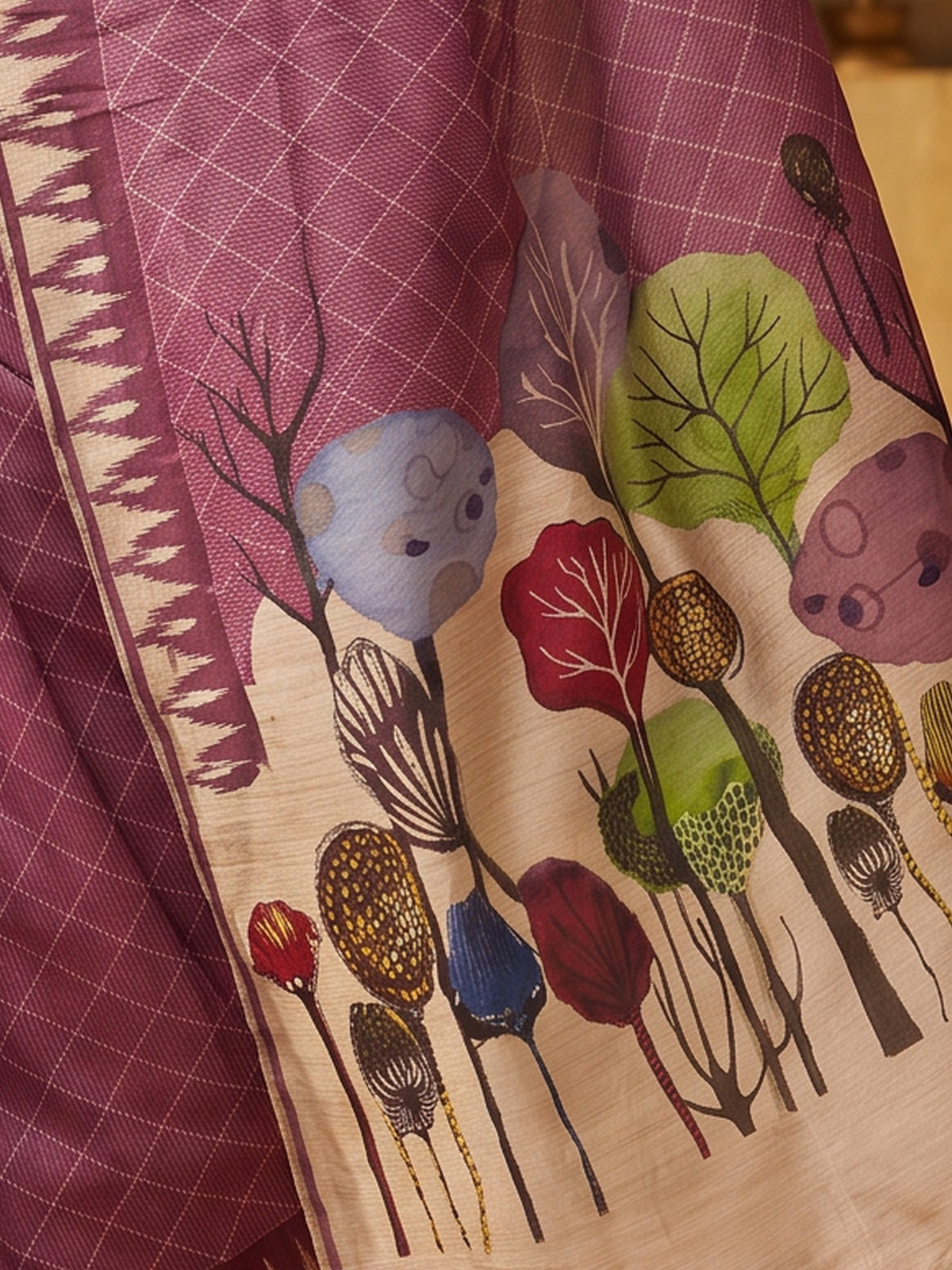 Pallu detail of mauve soft silk saree showing geometric pattern design and printed border