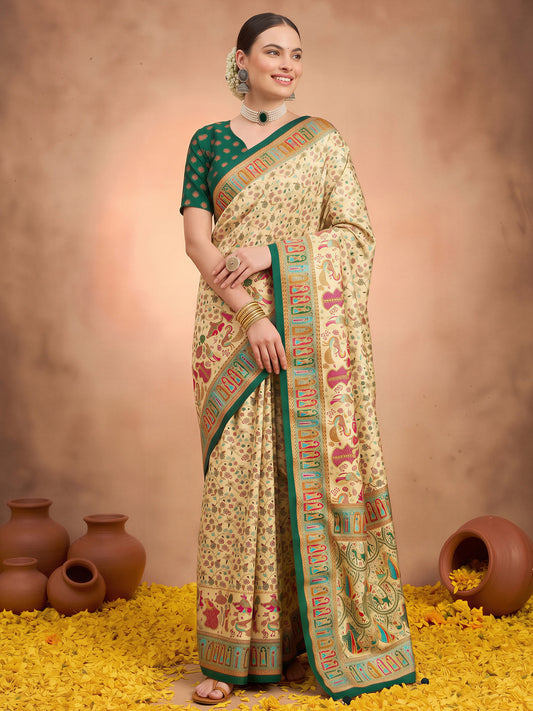 Woman wearing cream silk blend saree with metallic foil print work and green blouse