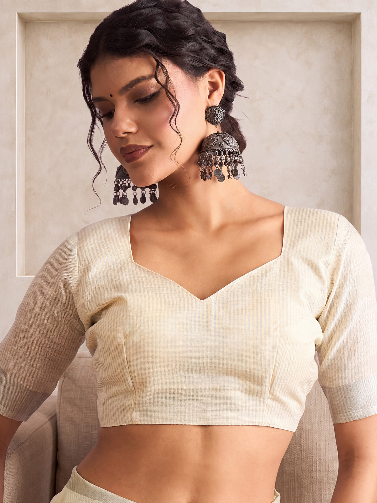 Unstitched off white linen blouse piece with ethnic motif design