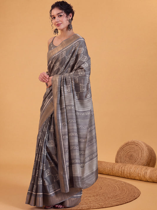 Woman wearing grey silk blend saree with hand block-printed motifs and grey blouse