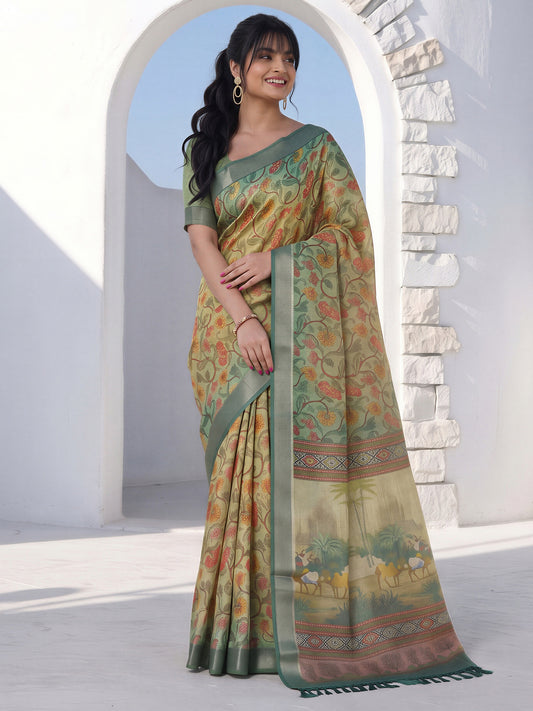 Woman wearing light green cotton silk saree with botanical floral and leaf design and light green blouse