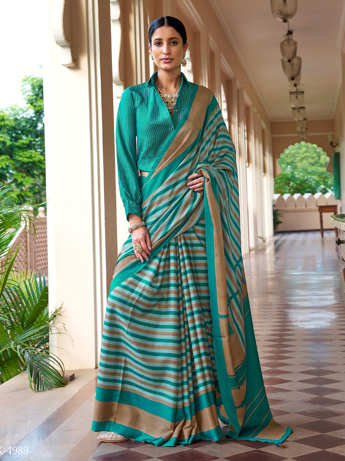 Teal Green striped crepe saree with teal green blouse piece
