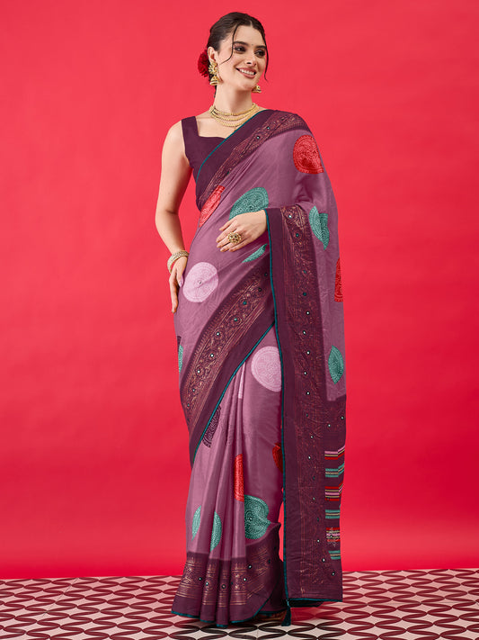 Woman wearing mauve georgette saree with bandhani tie-dye dot work and wine blouse