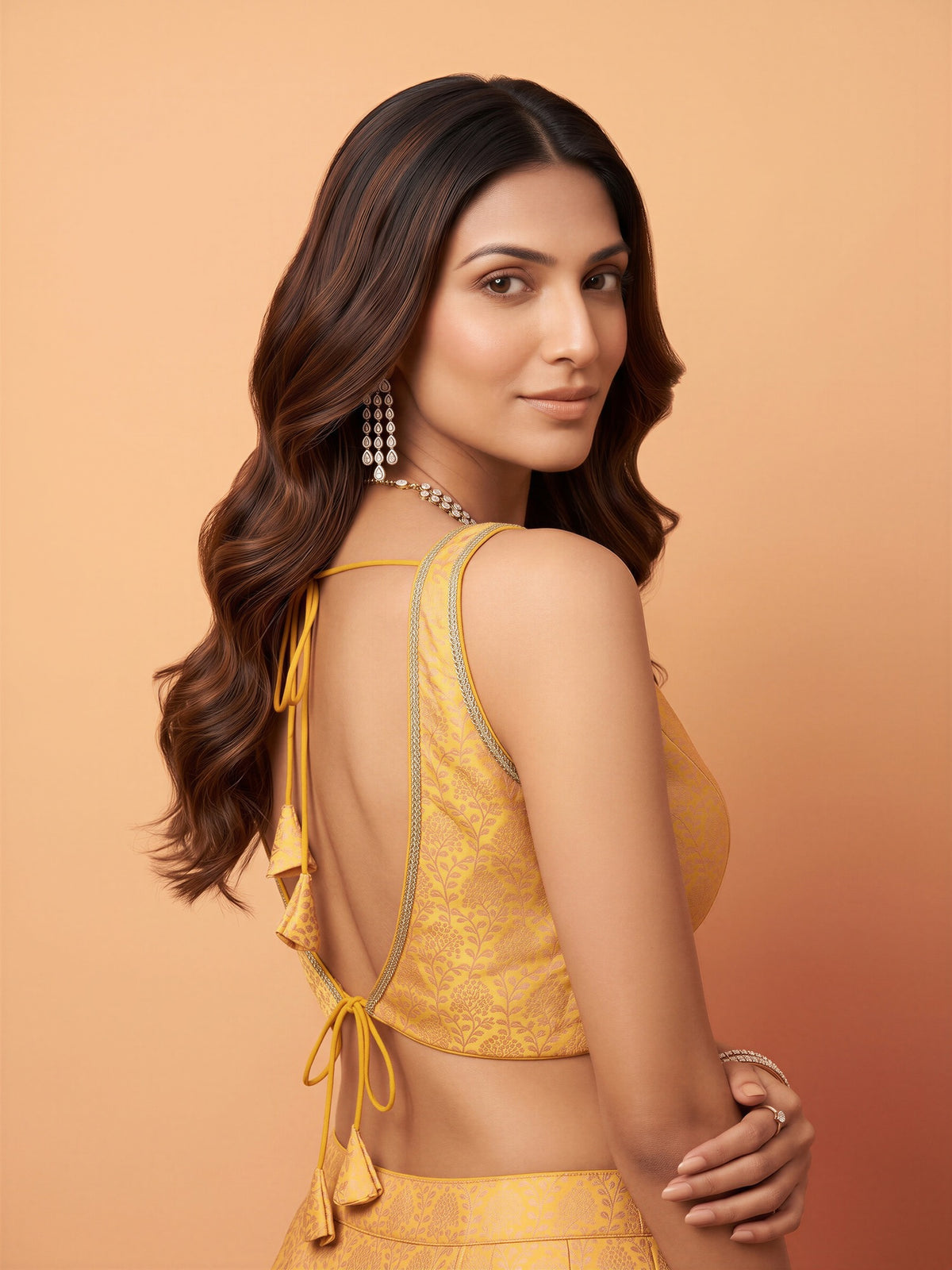 Yellow woven brocade silk blend sleeveless readymade saree blouse with deep v neck view 1