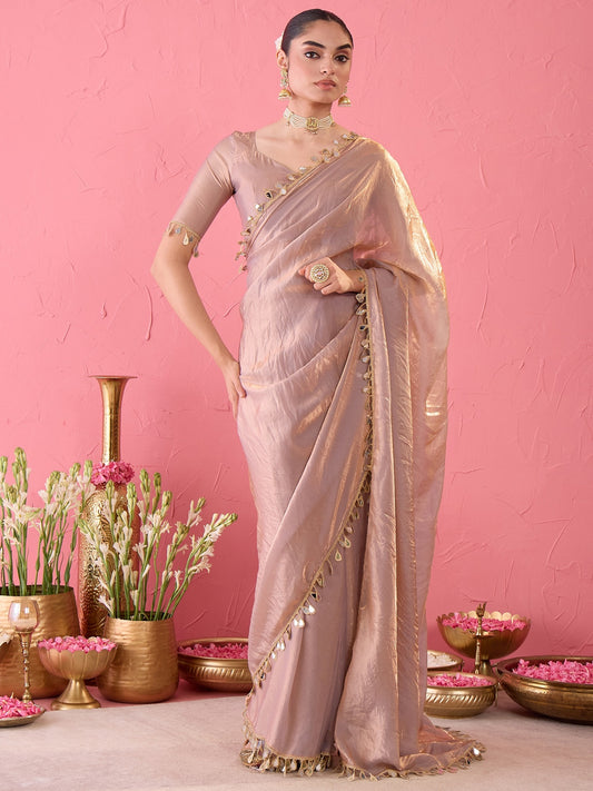 Woman wearing metallic satin ready to wear saree with clean solid-tone finish and metallic blouse
