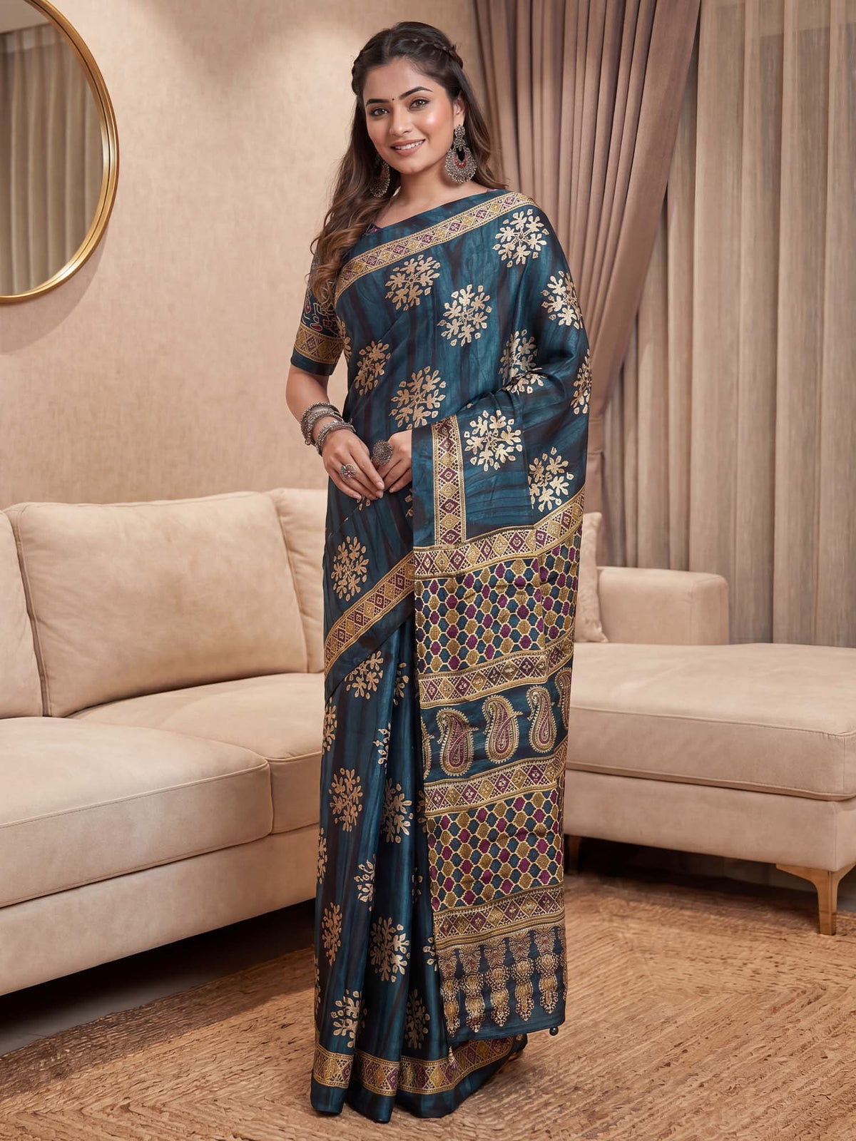 Woman wearing teal blue pure crepe saree with ajrak block-print motif work and teal blue blouse