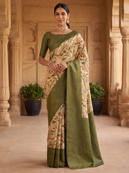 Woman wearing cream silk blend saree with all-over floral design and green blouse