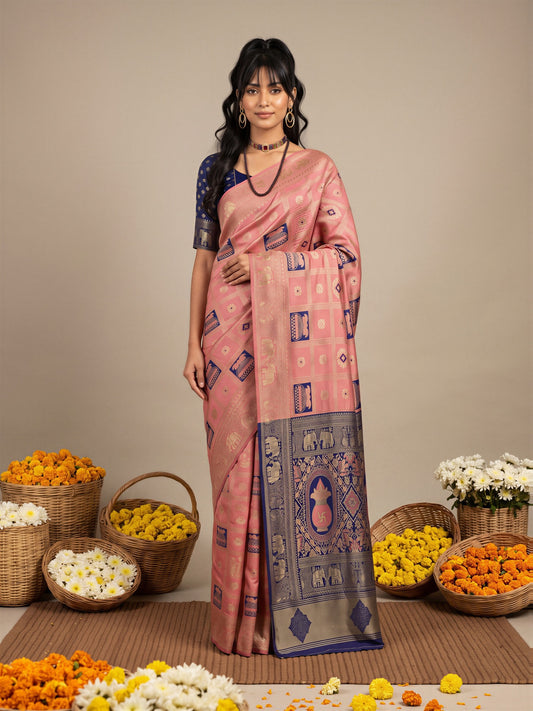 Woman wearing peach litchi silk saree with woven motif design and navy blue blouse