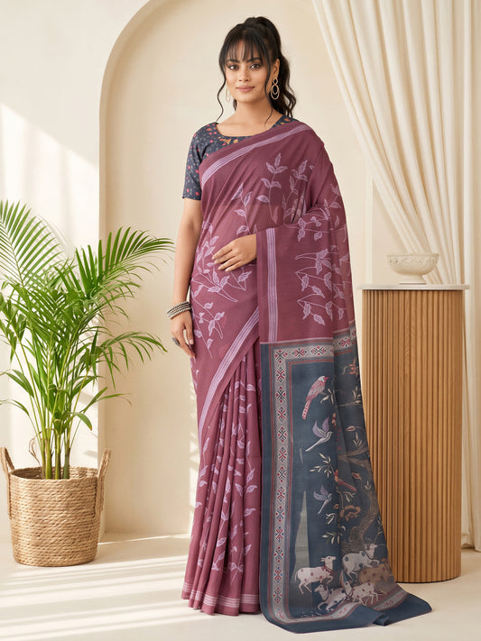 Woman wearing mauve linen blend saree with botanical floral and leaf design and navy blue blouse
