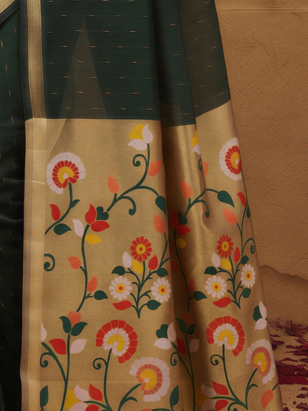 Pallu detail of dark brown silk blend saree showing striped pattern design and zari border