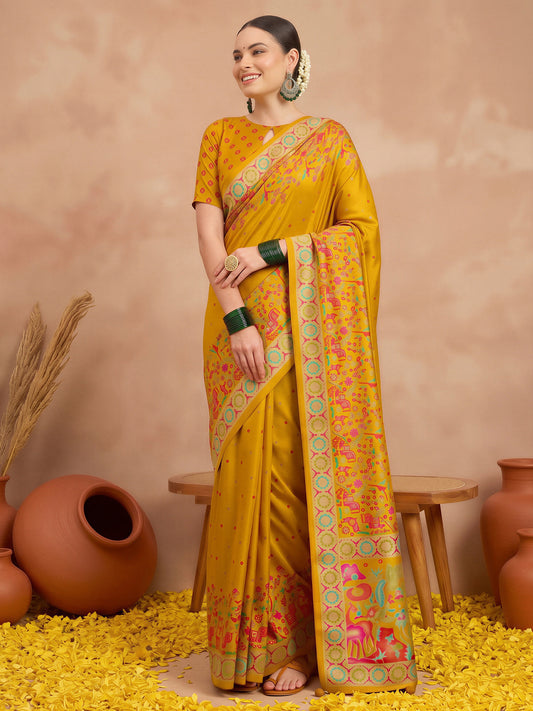 Woman wearing mustard silk blend saree with metallic foil print work and mustard blouse