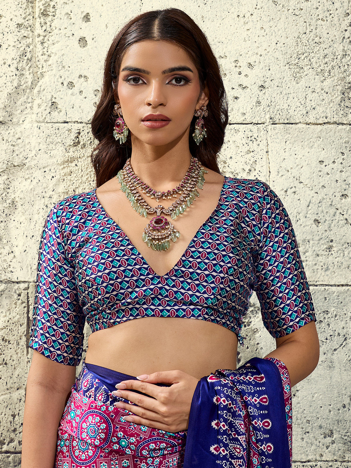 Unstitched blue satin blouse piece with ajrak design