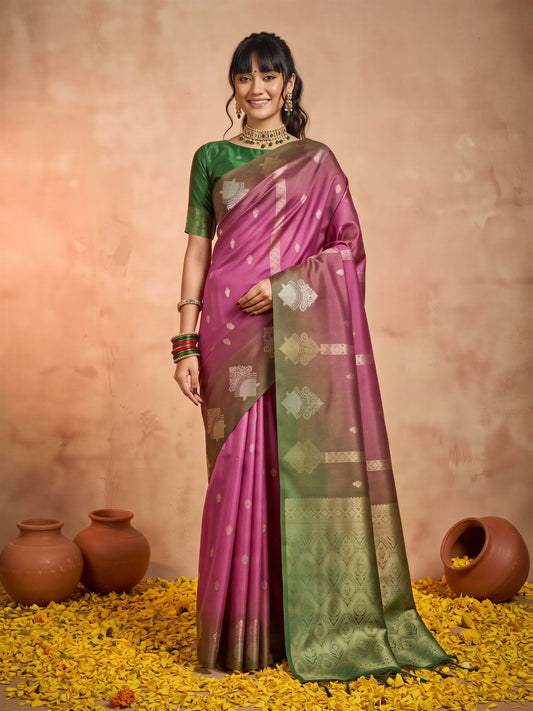 Woman wearing magenta cotton blend saree with ornamented surface design and green blouse