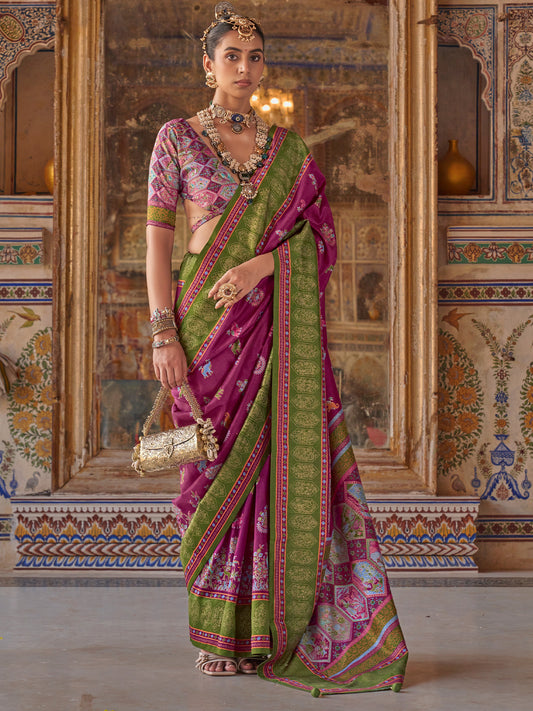Woman wearing purple silk blend saree with traditional indian motif work and multicolored blouse