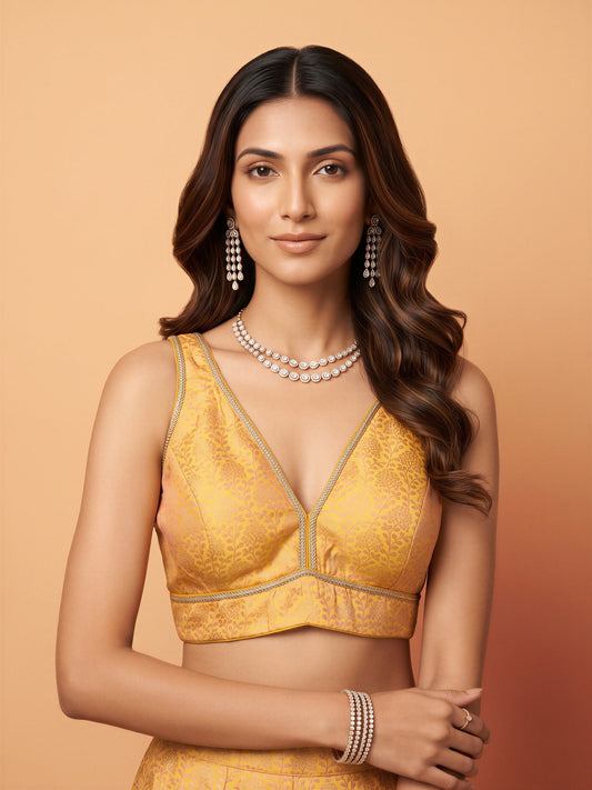 Yellow woven brocade silk blend sleeveless readymade saree blouse with deep v neck