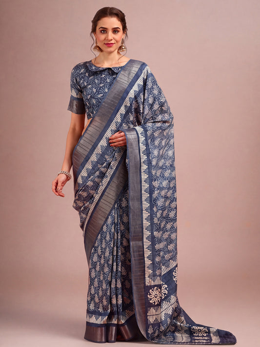 Woman wearing navy blue cotton silk saree with traditional indian motif work and navy blue blouse
