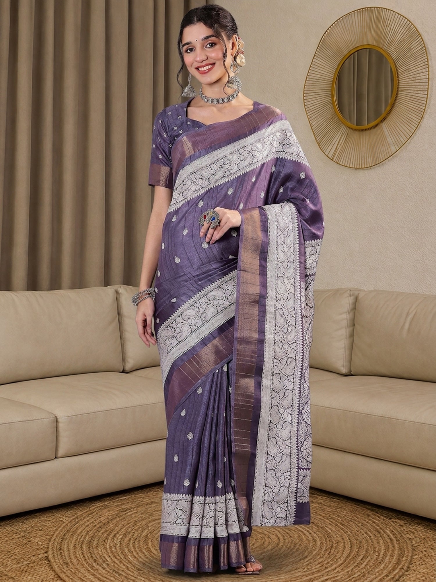 Woman wearing lavender silk blend saree with traditional indian motif work and lavender blouse