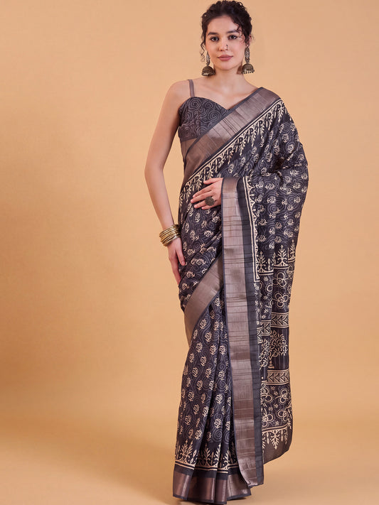 Woman wearing black silk blend saree with bagh block-print motif work and black blouse