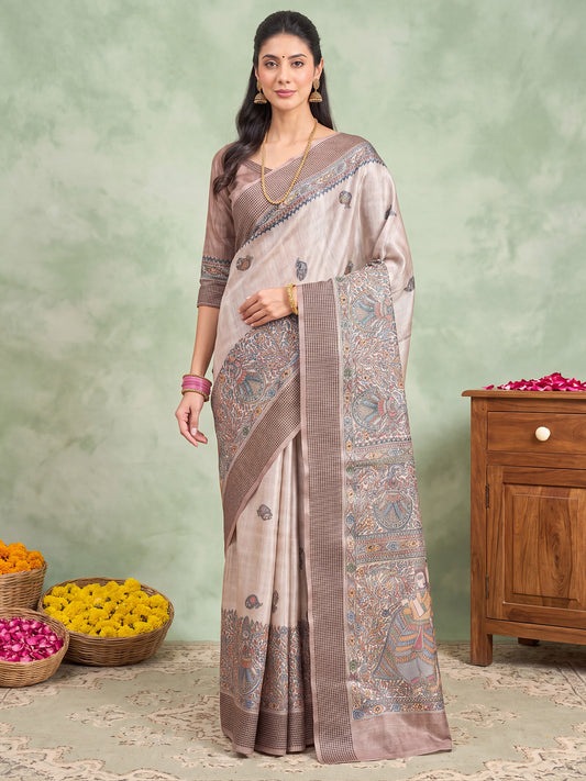 Woman wearing beige manipuri silk saree with madhubani folk-art motifs and beige blouse