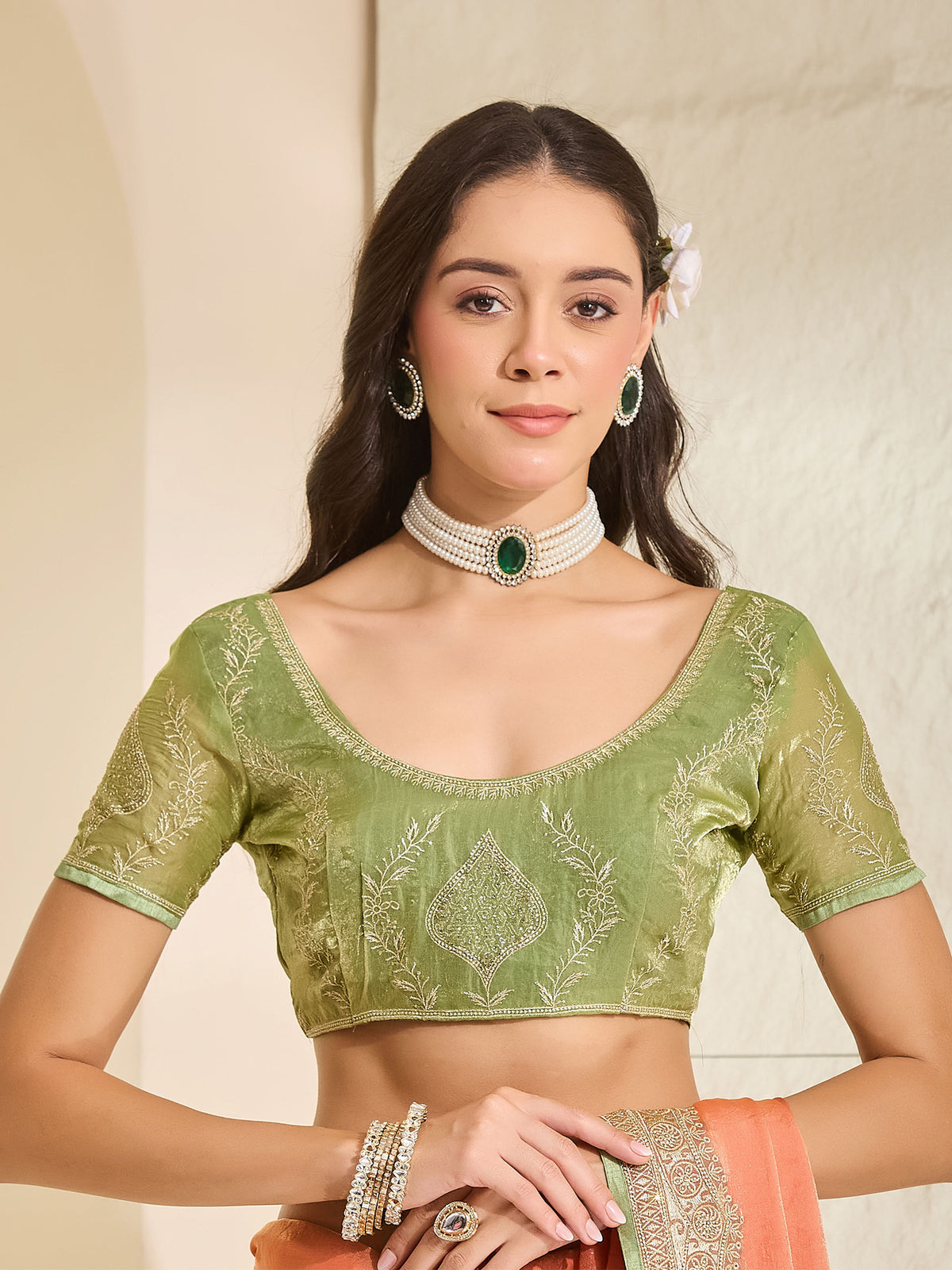 Unstitched light green satin blouse piece with embellished design