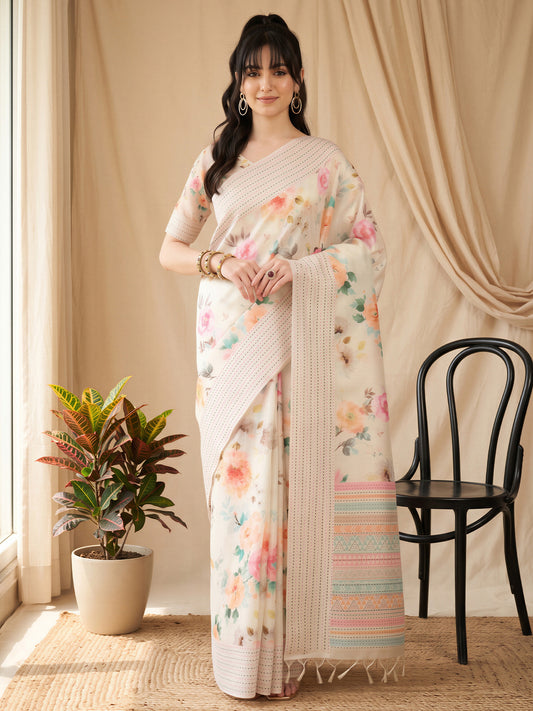 Woman wearing off white silk cotton saree with botanical floral and leaf design and off white blouse