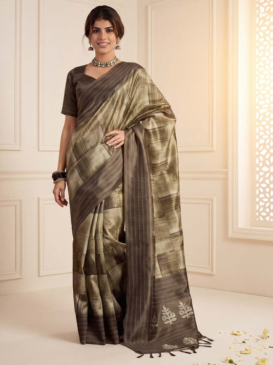 Woman wearing olive cotton silk saree with geometric pattern design and olive blouse