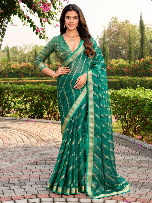 Woman wearing green chiffon saree with metallic foil print work and green blouse
