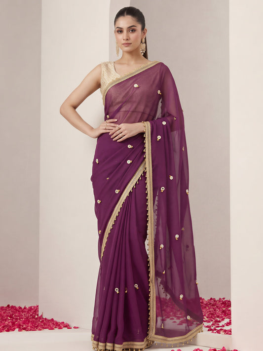 Wine embellished poly georgette saree with gold blouse piece