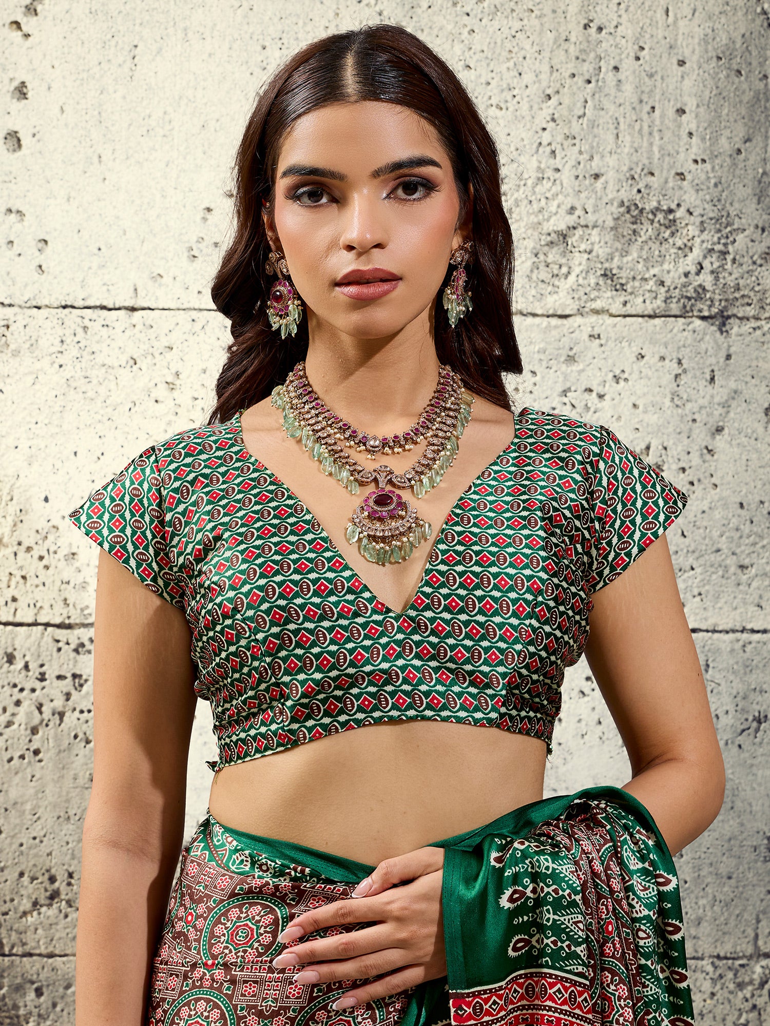 Unstitched green satin blouse piece with ajrak design