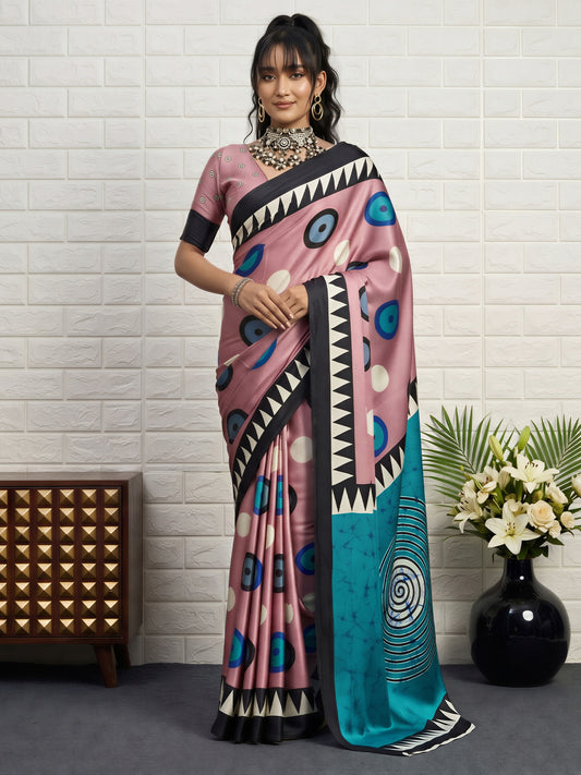 Woman wearing mauve satin saree with traditional indian motif work and mauve blouse