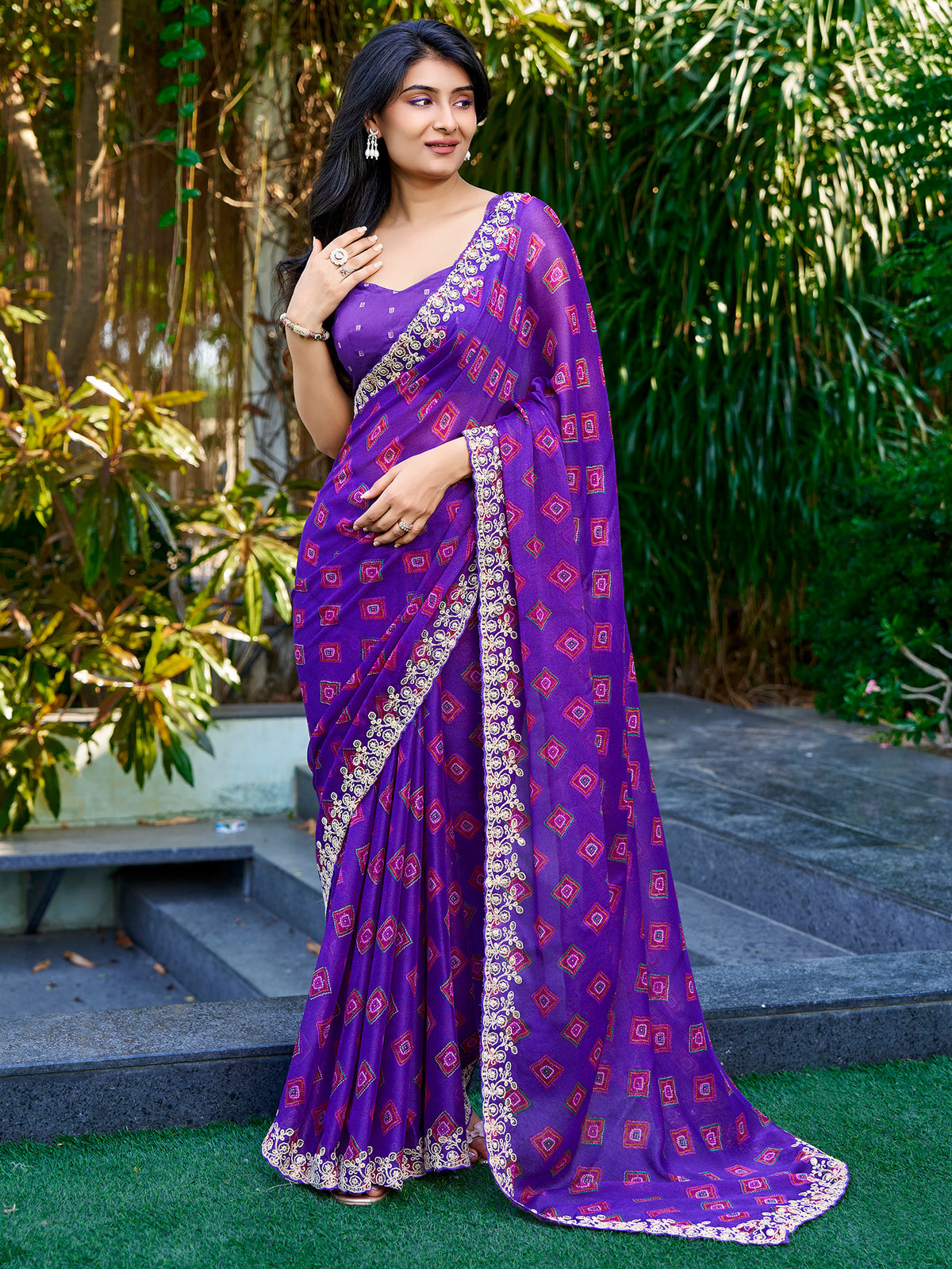 Woman wearing purple georgette saree with geometric pattern design and purple blouse