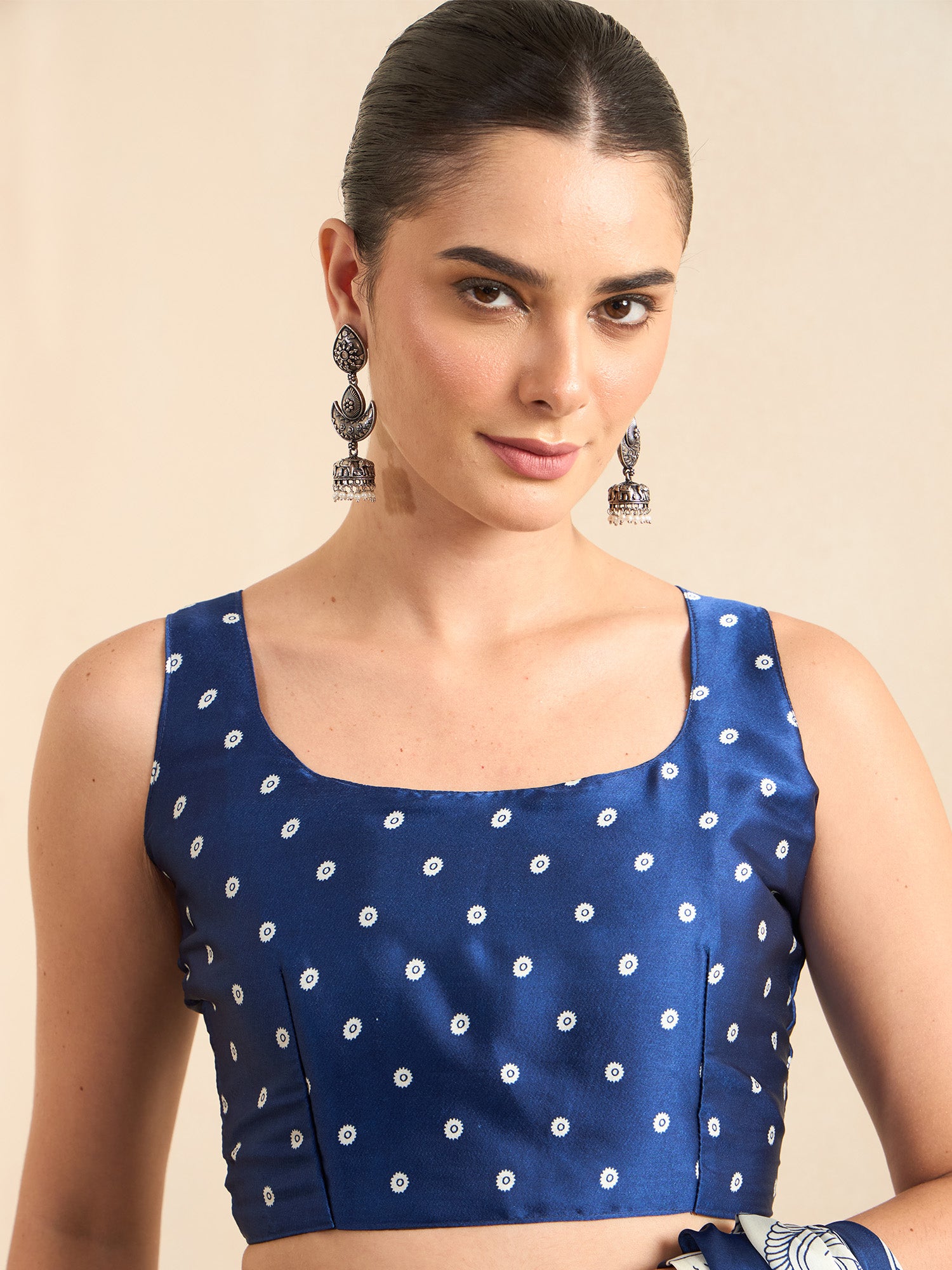 Unstitched blue satin blouse piece with ethnic motif design