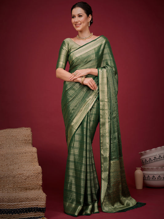 Woman wearing green viscose silk saree with striped pattern design and green blouse