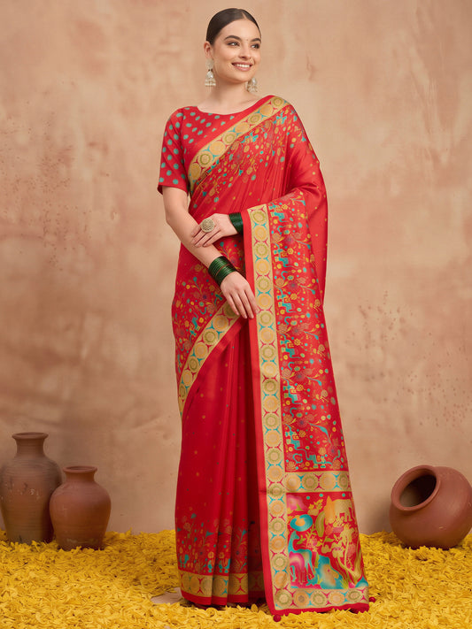 Woman wearing red silk blend saree with metallic foil print work and red blouse