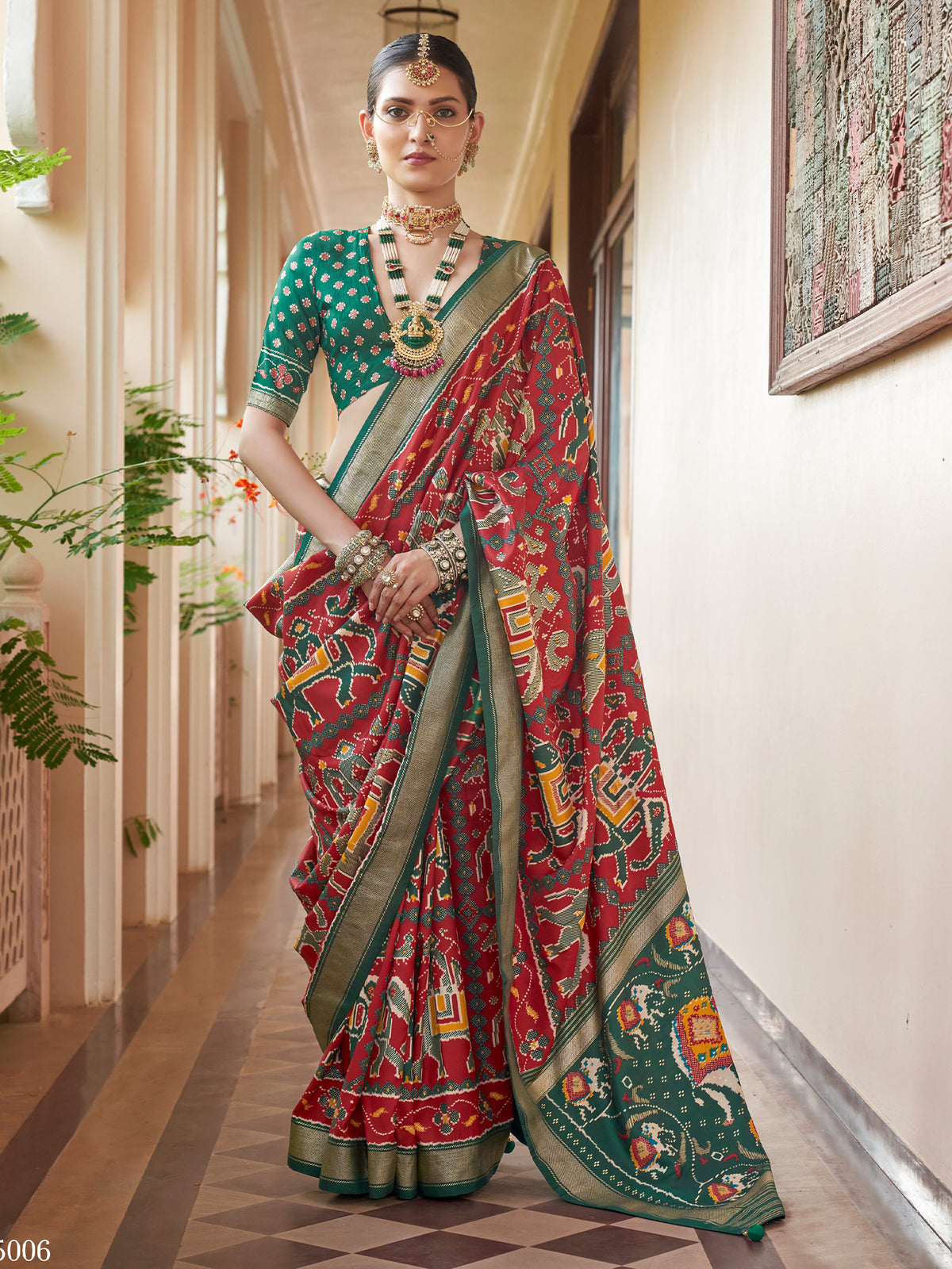 Red ikat silk blend saree with green blouse piece