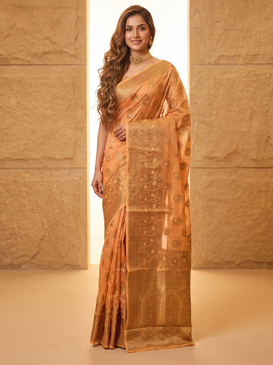 Woman wearing orange silk blend saree with zari butta (metallic motif) work and orange blouse