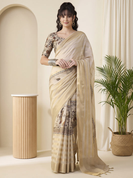 Woman wearing cream viscose silk saree with traditional indian motif work and beige blouse