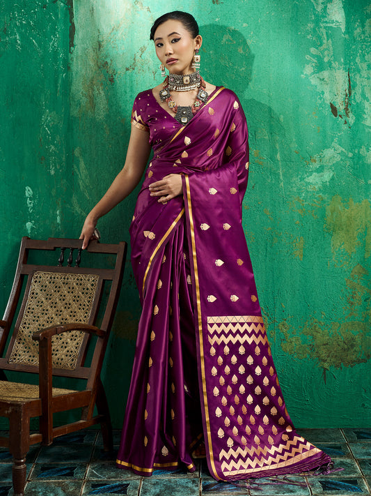 Woman wearing wine satin silk saree with zari butta (metallic motif) work and wine blouse