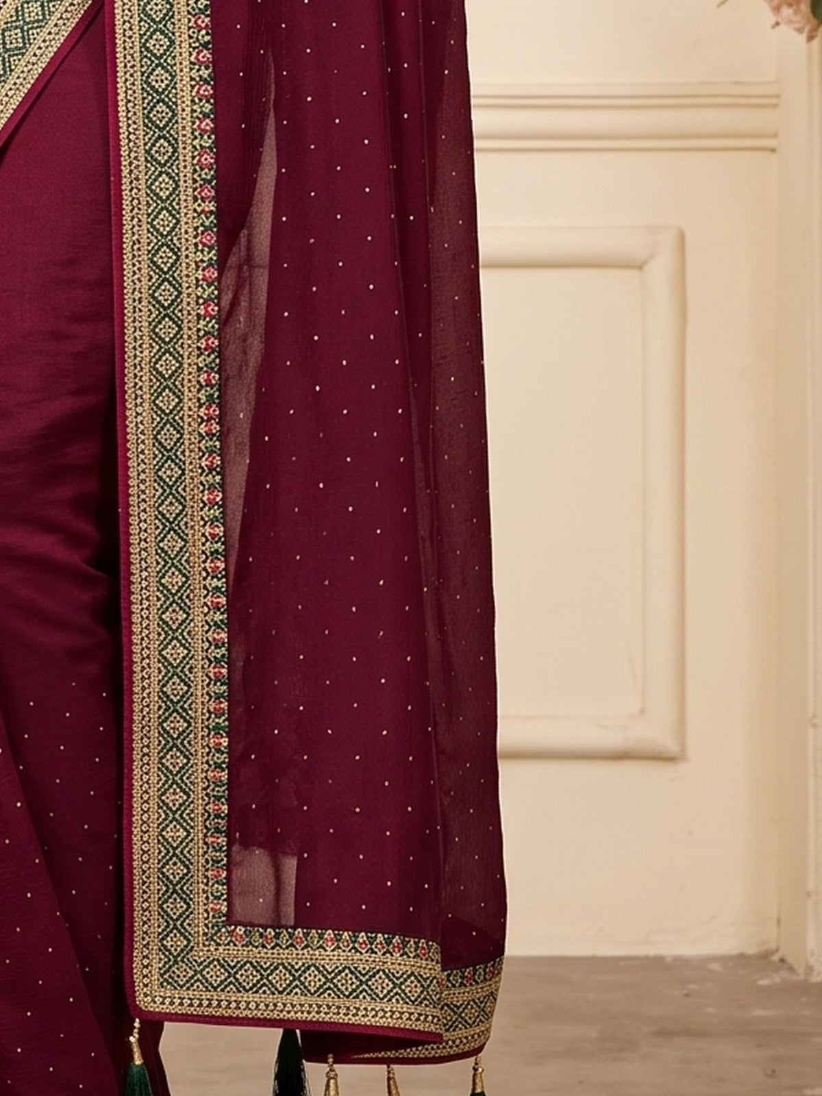 Pallu detail of purple vichitra silk saree showing ornamented surface design and embellished border