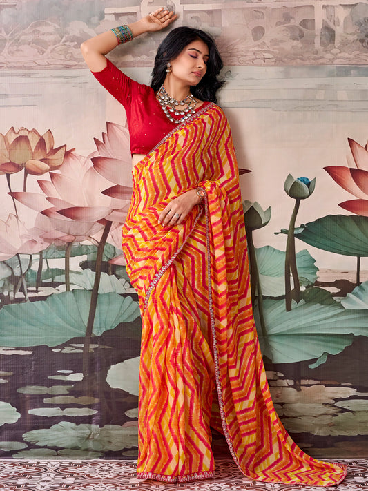Woman wearing orange georgette saree with chevron zigzag pattern and red blouse