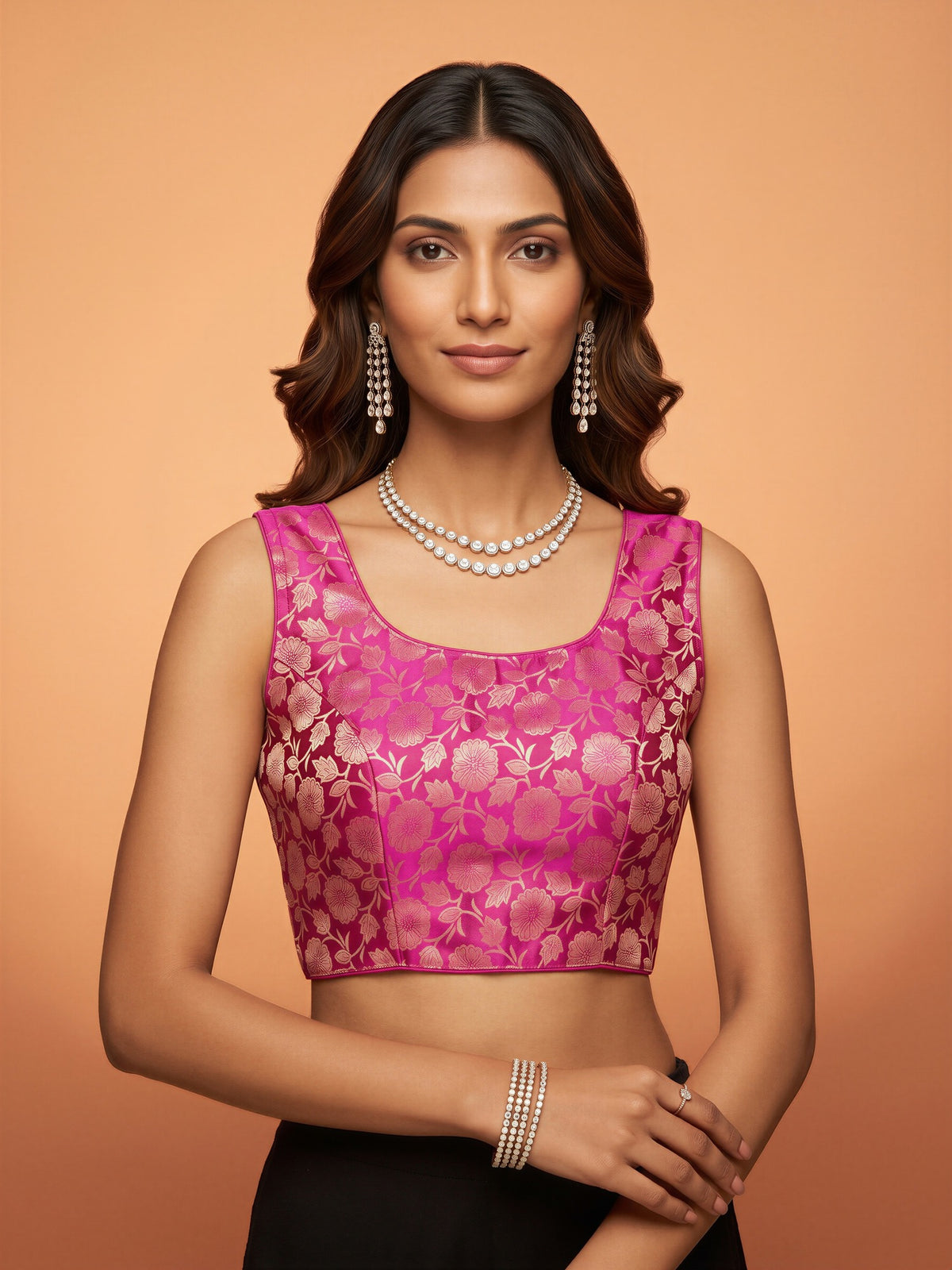 Magenta woven brocade silk blend sleeveless readymade saree blouse with round neck
